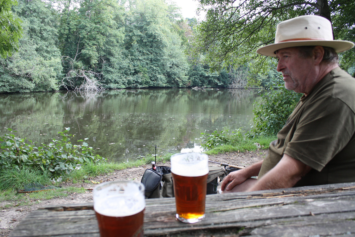 Fishing and drinking at Chiddingstone Castle lake.